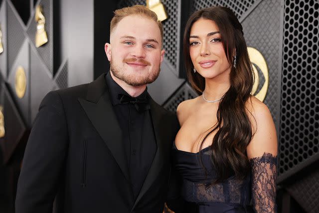 <p>Neilson Barnard/Getty</p> Zach Bryan and Brianna LaPaglia at the 2024 Grammys in Los Angeles on Feb. 4