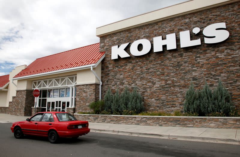 FILE PHOTO: A car drives by the Kohl's department store in Arvada
