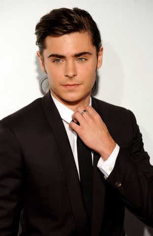 <p>Carlos Alvarez/Getty</p> Zac Efron in 2009 premiering '17 Again'