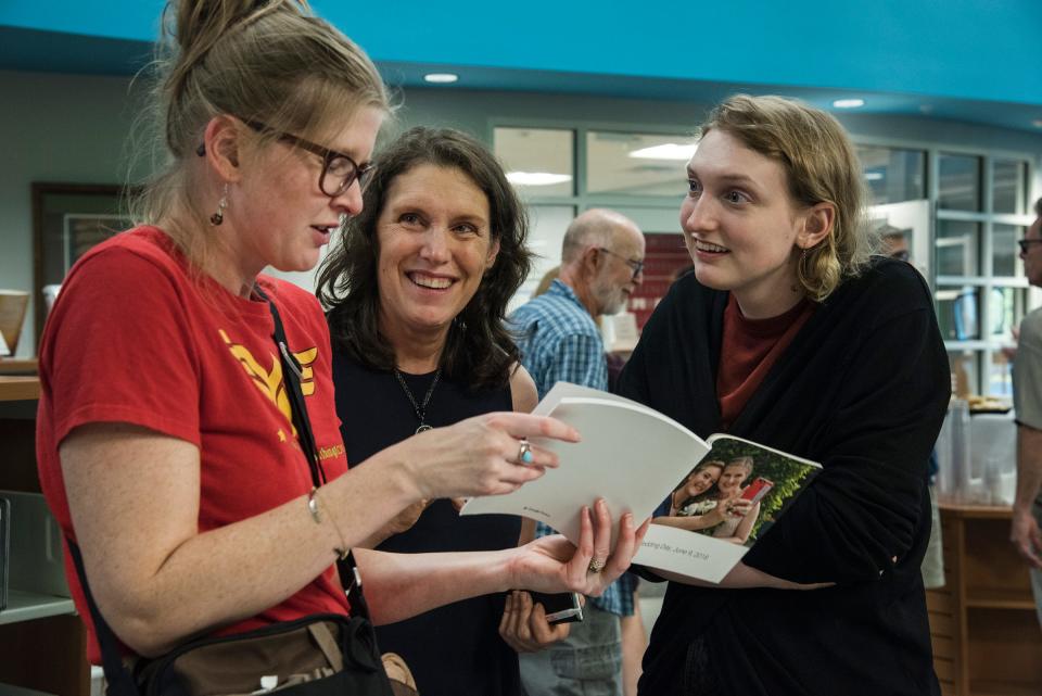 Jen Mason (center) and her daughter Clare Hancock (right) chat with Erin Samarasinghe at the Spirited Discussion at the History Book Festival in Lewes.