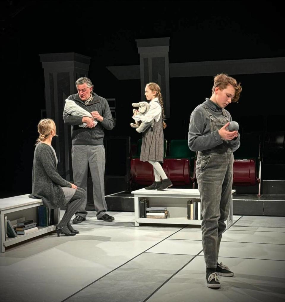 Zoey Matthews of Olympia, right, stars as Jonas in “The Giver” at Lakewood Playhouse. The cast also includes, from left, Whitney Shafer, Ben Stahl and Olive Dustan.