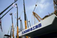 FILE PHOTO: Heavy machinery of XCMG is seen at Bauma China, the International Trade Fair for Construction Machinery in Shanghai, China November 27, 2018. REUTERS/Aly Song