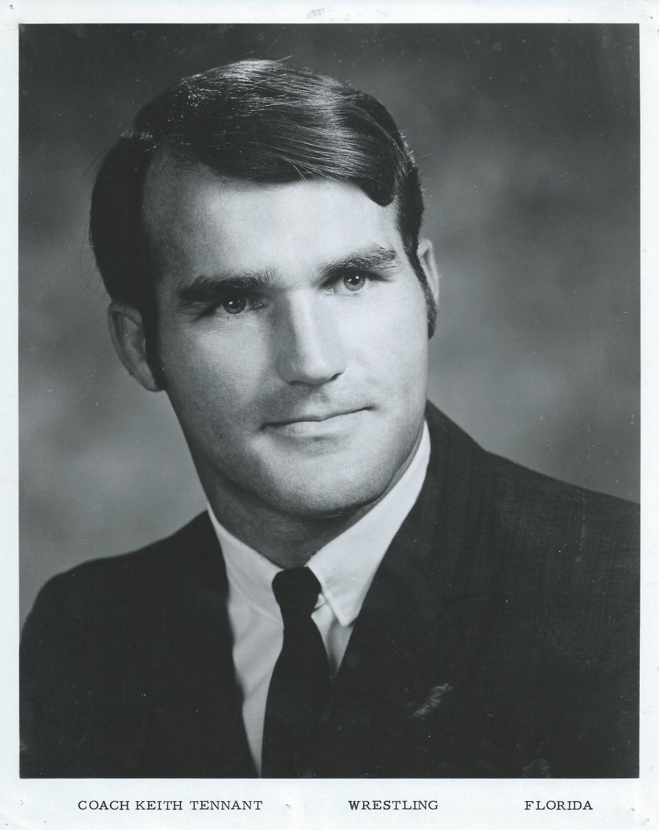 Keith Tennant was hired to coach the Gators' first wrestling team.