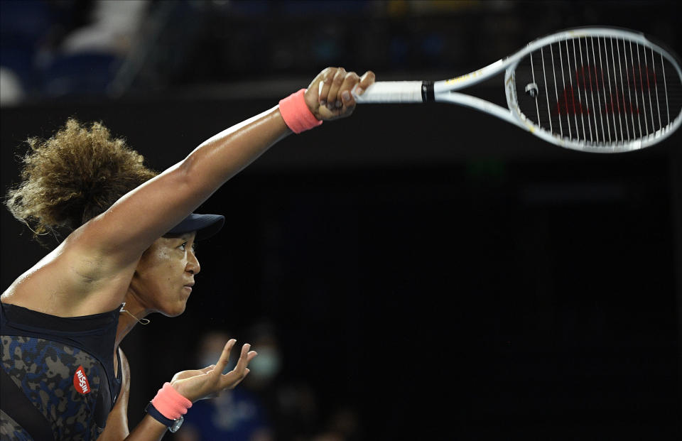 Japan's Naomi Osaka serves to United States' Jennifer Brady during the women's singles final at the Australian Open tennis championship in Melbourne, Australia, Saturday, Feb. 20, 2021.(AP Photo/Andy Brownbill)