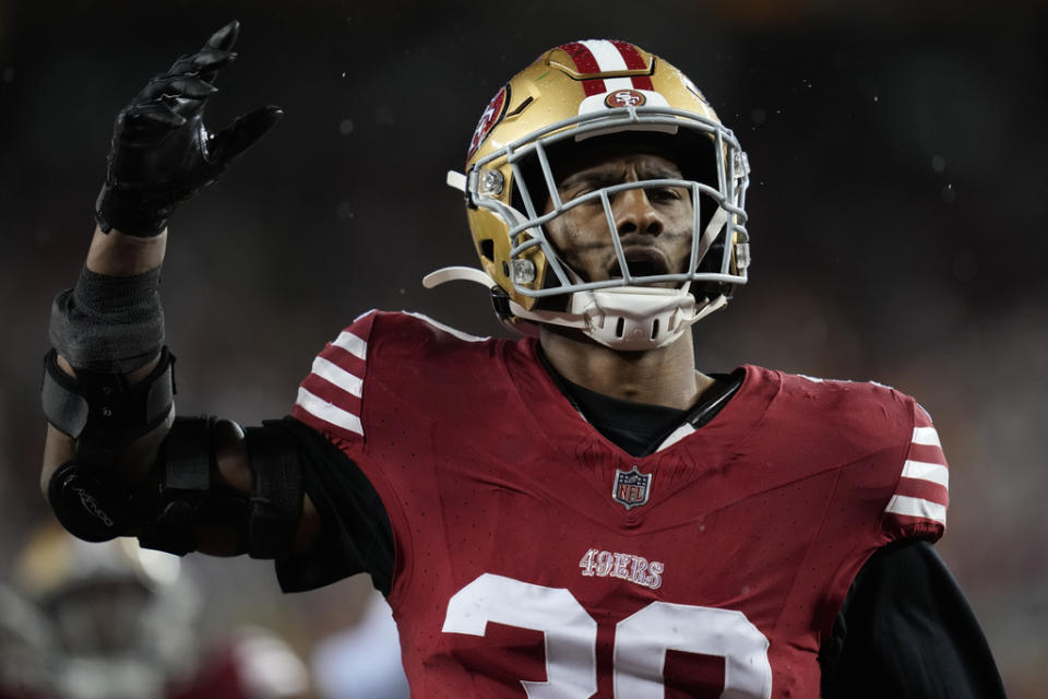 San Francisco 49ers safety George Odum (30) hypes up the crowd on a kick return during an NFL football game against the Green Bay Packers Sunday, Jan. 21, 2024, in Inglewood, Calif. (AP Photo/Ashley Landis)