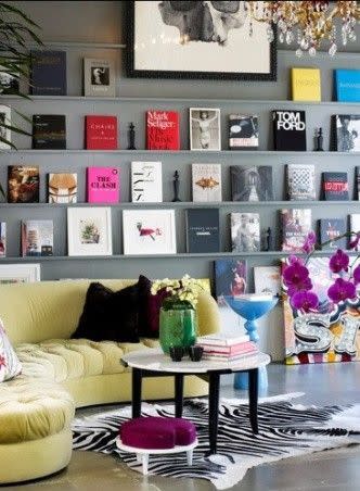 Display them with the jacket, rather than the spine, facing the room. The books then work as pieces of art in your choosen room. [Photo: Pinterest]