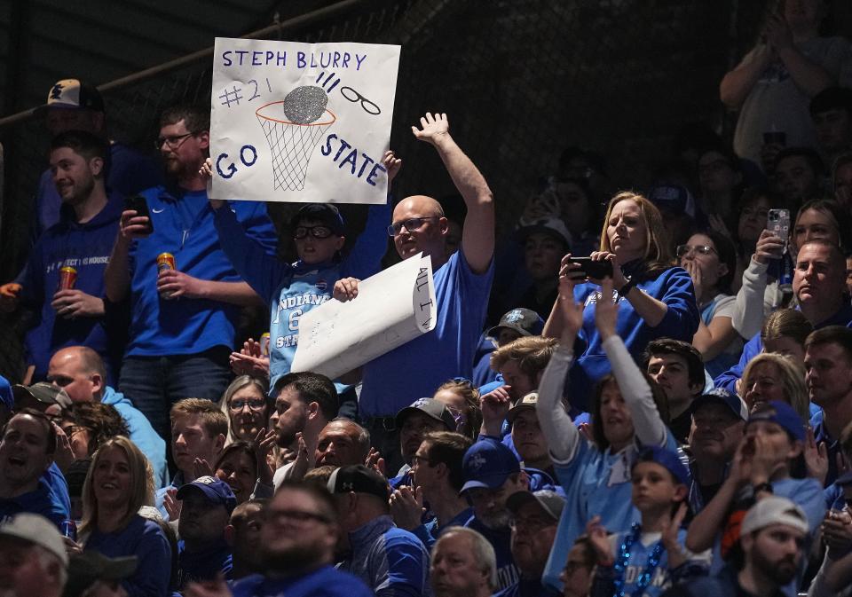 Indiana State Sycamores fans hold up signs in the stands Thursday, April 4, 2024, during the NIT championship game at Hinkle Fieldhouse in Indianapolis. The Seton Hall Pirates defeated the Indiana State Sycamores, 79-77.