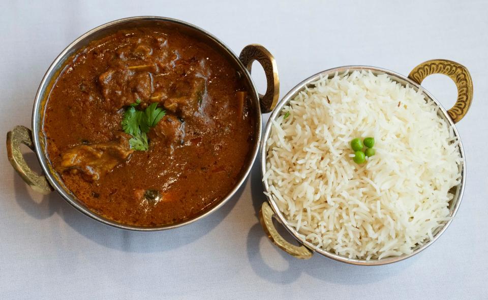 Rice with a goat curry at Yak and Yeti in Fishers, Monday, Oct. 30, 2023, a Himalayan restaurant that serves dishes from the region near Nepal.