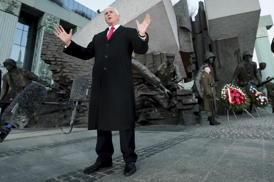 United States Vice President Mike Pence speaks during a statement in front of the 'Warsaw Uprising Monument' in Warsaw, Poland, Thursday, Feb. 14, 2019. The Polish capital is host for a two-day international conference on the Middle East, co-organized by Poland and the United States. (AP Photo/Michael Sohn)