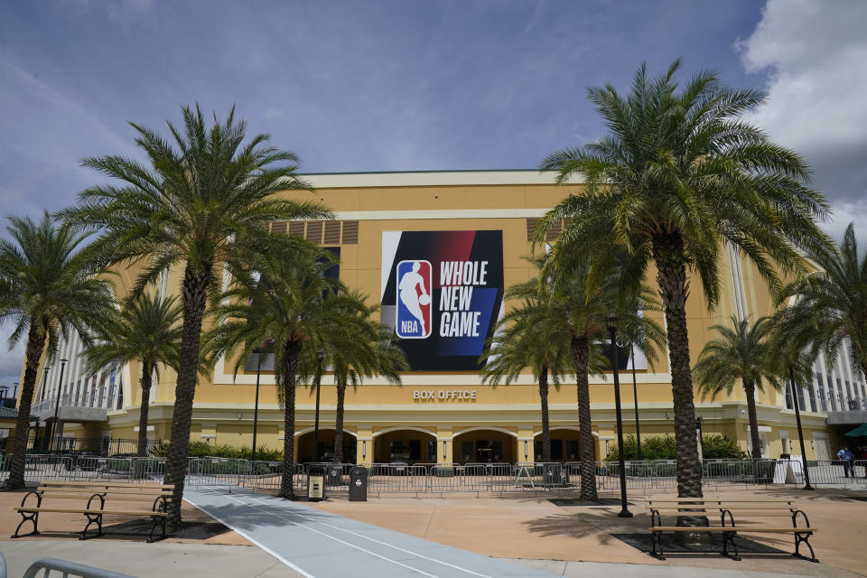 An NBA logo is displayed outside a basketball arena Friday, Aug. 28, 2020, at Walt Disney World in Lake Buena Vista, Fla. (AP Photo/Ashley Landis, Pool)