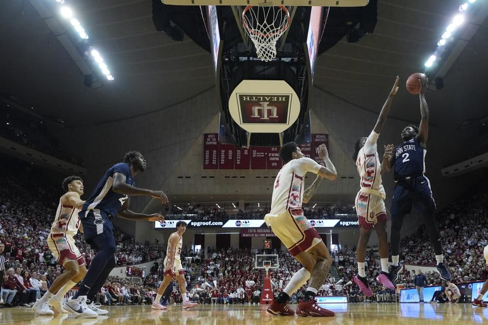 Penn State's D'Marco Dunn (2) shoots over Indiana's Mackenzie Mgbako (21) during the first half of an NCAA college basketball game, Saturday, Feb. 3, 2024, in Bloomington, Ind. (AP Photo/Darron Cummings)
