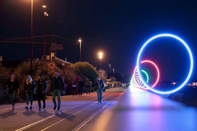 Youths walk near a nightclub in Nantes, France. (Photo: via Associated Press)