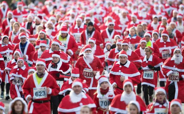 Participants dressed in Father Christmas costumes take part in the traditional Santa Claus run in Michendorf, eastern Germany, on December 10, 2017. (RALF HIRSCHBERGER/AFP/Getty Images)