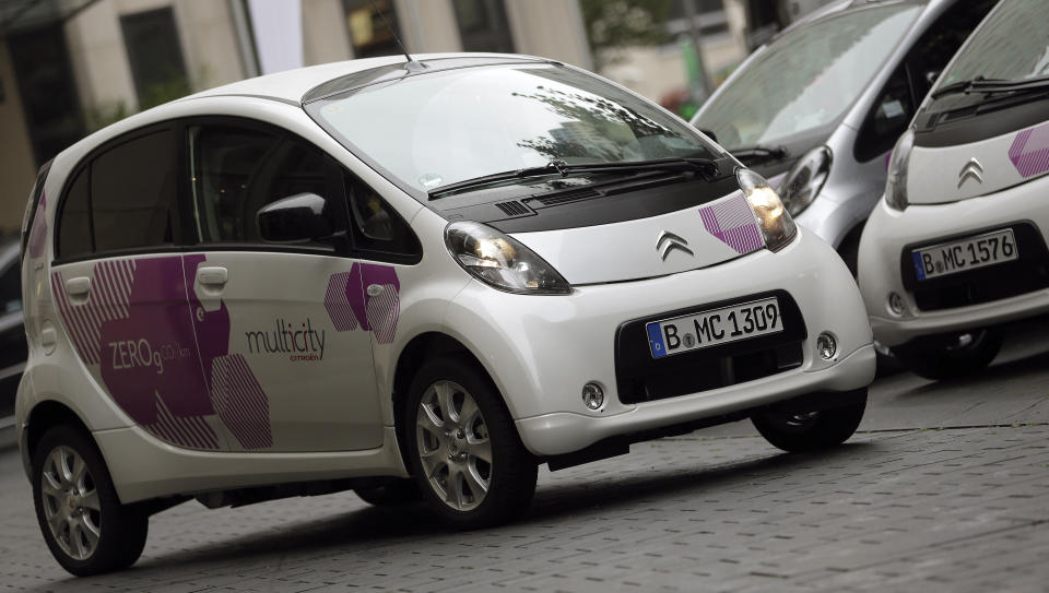 In this photo taken Wednesday, Sept. 5, 2012, Citroen C-Zero electric cars are pictured during the introducing of the 'Citroen Multicity Car Sharing' project in Berlin, Germany. First they ignored it, then they jumped on board. Now some German automakers are switching gears to take car sharing from city streets to the Autobahn, a maneuver that’s being closely watched by others who wonder whether it could turn out to be a dead end for the industry. (AP Photo/Michael Sohn)