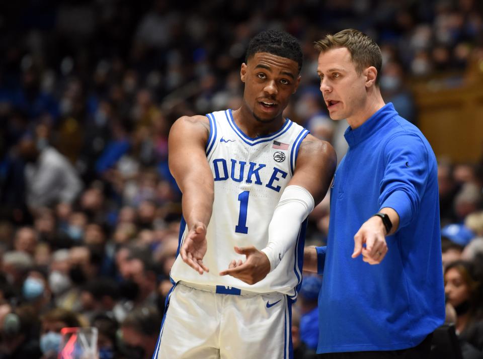 Duke associate head coach Jon Scheyer directs  guard Trevor Keels during the second half against Wake Forest at Cameron Indoor Stadium.