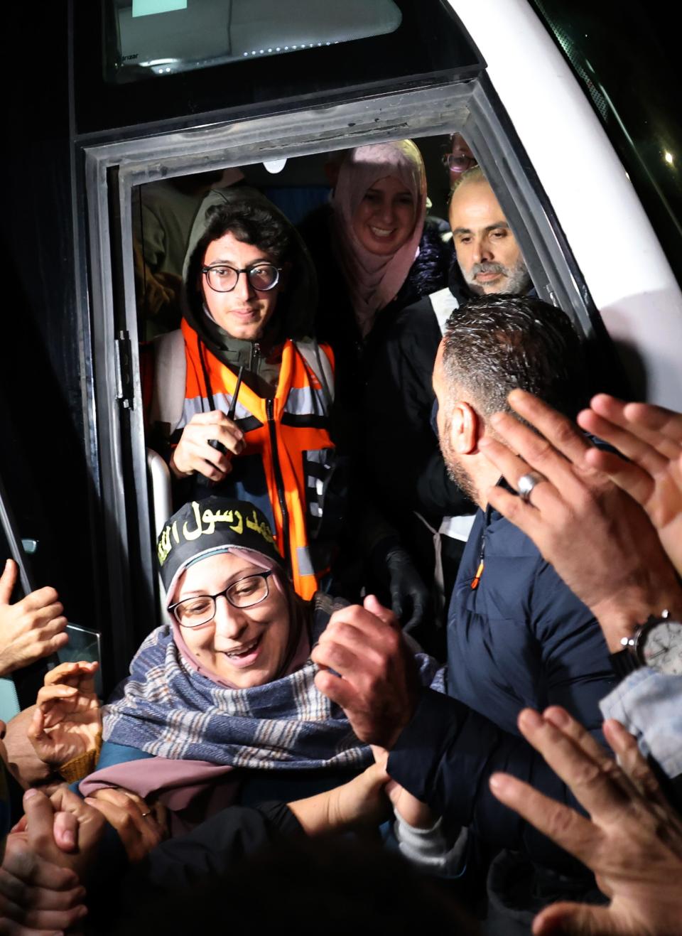 Prisoners greeted by crowds on their release (EPA)