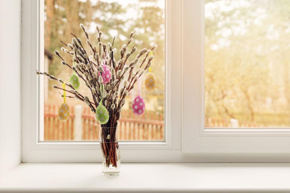 Keep things small with Easter egg "trees" in vases.