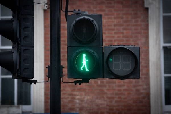 Green woman crossing in LondonTfL