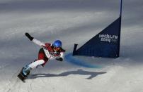 Canada's Marianne Leeson competes during the women's snowboard parallel giant slalom qualification run at the 2014 Sochi Winter Olympic Games in Rosa Khutor February 19, 2014. REUTERS/Dylan Martinez (RUSSIA - Tags: OLYMPICS SPORT SNOWBOARDING)