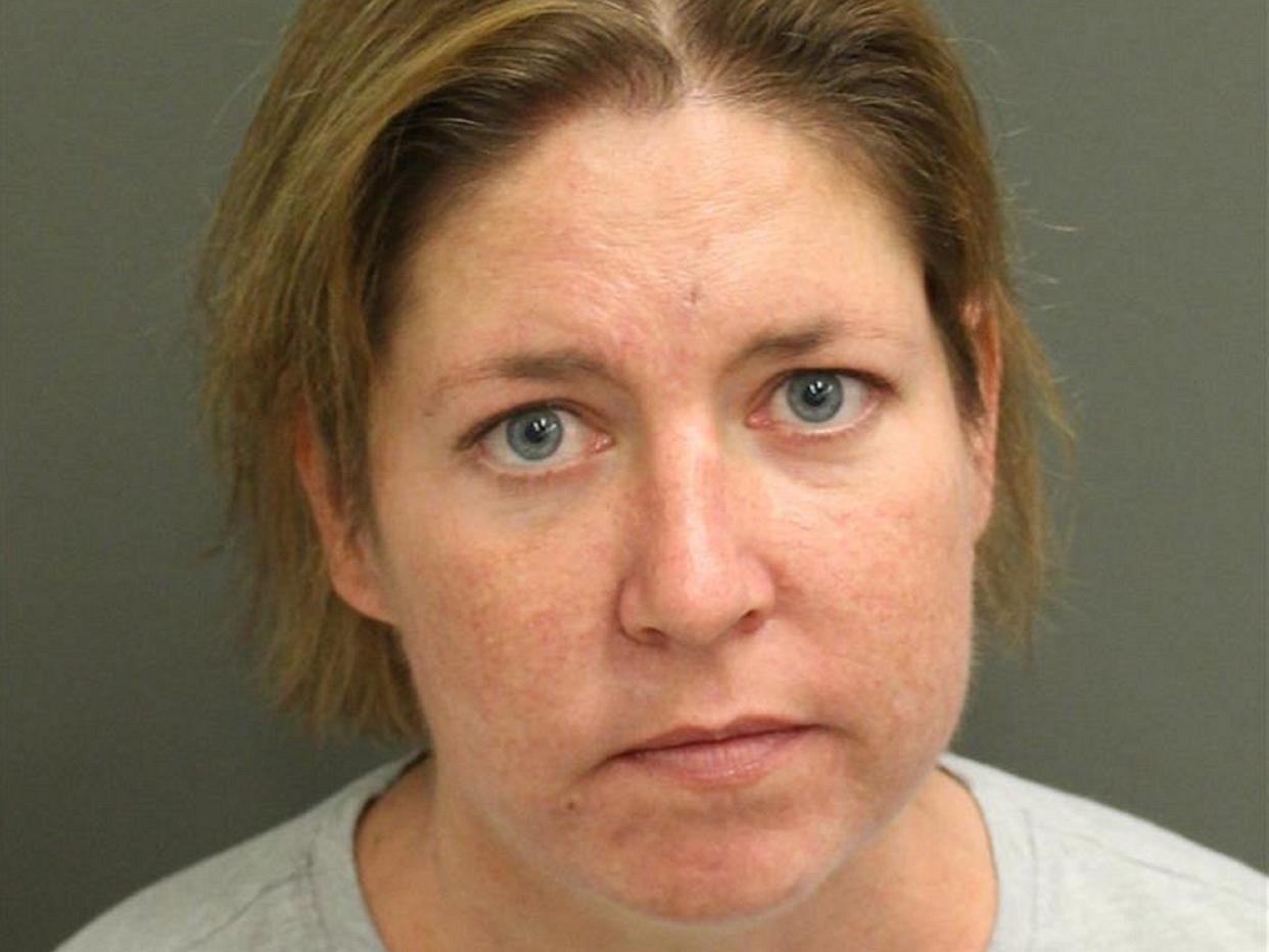 Sarah Boone, 46, of Winter Park, Florida, has been charged with second degree murder after allegedly zipping her boyfriend Jorge Torres in a suitcase and leaving him to die: Orange County Jail