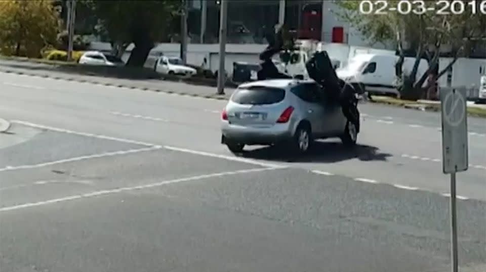 The motorcyclist had no time to react and was sent flying over the bonnet. Source: 7 News