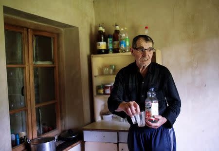 Temur Batirashvili, father of Tarkhan Batirashvili, speaks during an interview at his home in the village of Birkiani in the Pankisi Gorge, Georgia, May 19, 2016. REUTERS/David Mdzinarishvili/Files
