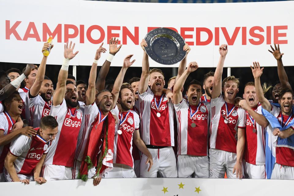 Ajax captain Matthijs de Ligt holds the champions plate aloft. (Credit: Getty Images)