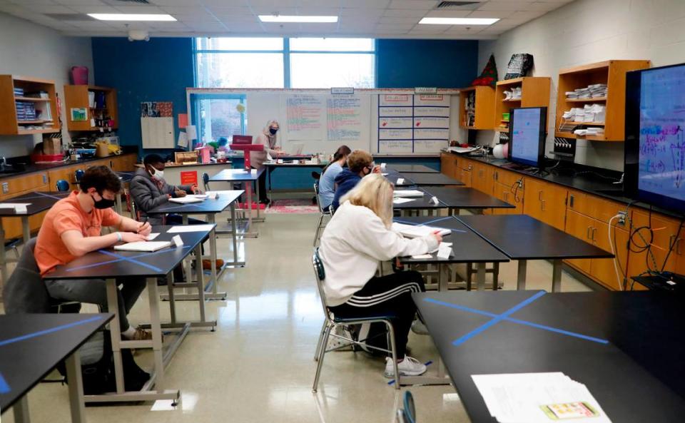 Students sit in Michele Jones’ pre-calculus blended class at Millbrook High School Wednesday morning, February 17, 2021. Wednesday is the the first day of face-to-face classes since March 2020 for Wake County high school students.