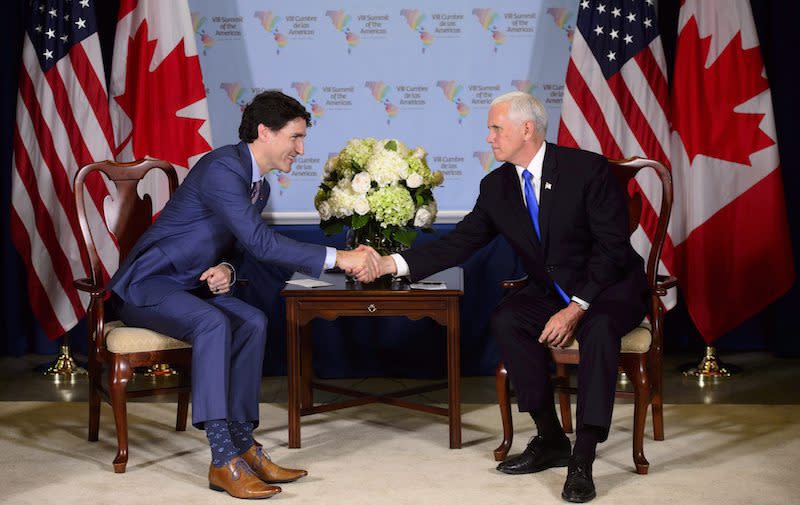 PHOTOS: Justin Trudeau meets with leaders in Lima, Paris and London