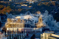 <p>The Georgia Dome is destroyed in a scheduled implosion Monday, Nov. 20, 2017, in Atlanta. The dome was not only the former home of the Atlanta Falcons but also the site of two Super Bowls, 1996 Olympics Games events and NCAA basketball tournaments among other major events. (AP Photo/Mike Stewart) </p>