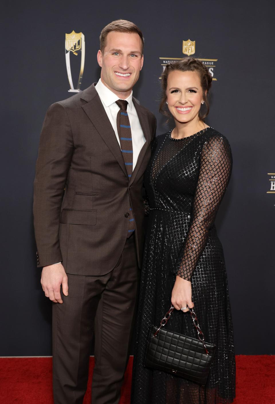 PHOENIX, ARIZONA - FEBRUARY 09: Kirk Cousins (L) of the Minnesota Vikings and Julie Cousins attend the 12th annual NFL Honors at Symphony Hall on February 09, 2023 in Phoenix, Arizona. (Photo by Ethan Miller/Getty Images)