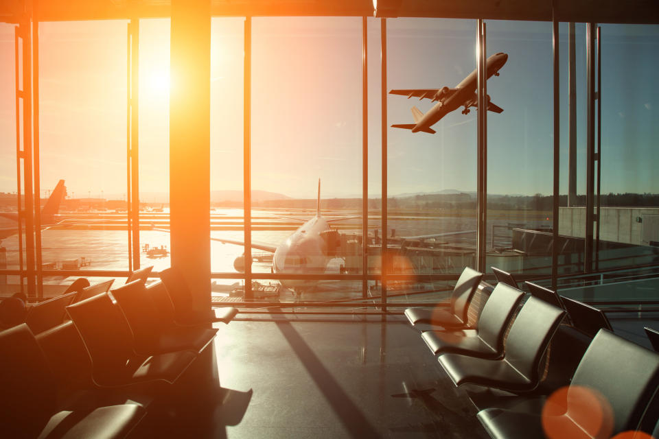 Airport interior and an airplane at take off