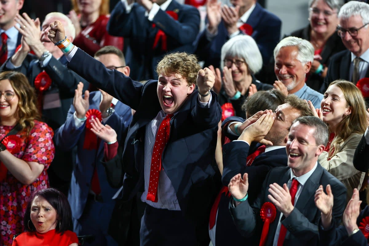 <p>Scottish Labour supporters celebrate after the party scored victory in exit polls at declaration for Glasgow North East at Emirates Arena</p> (Getty Images)