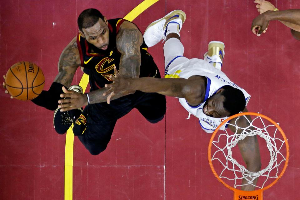 LeBron James shoots against Golden State forward Draymond Green during Game 4 of the 2018 NBA Finals.