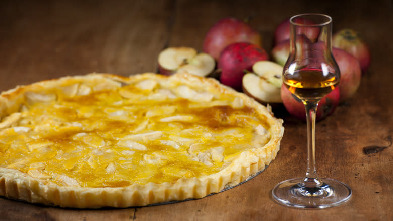 Normandy tart with a glass of brandy