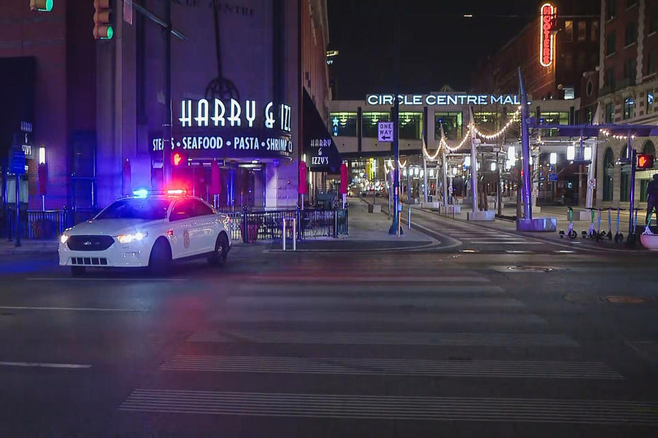 Police on the scene after a shooting outside Circle Centre Mall in Indianapolis (WTHR)