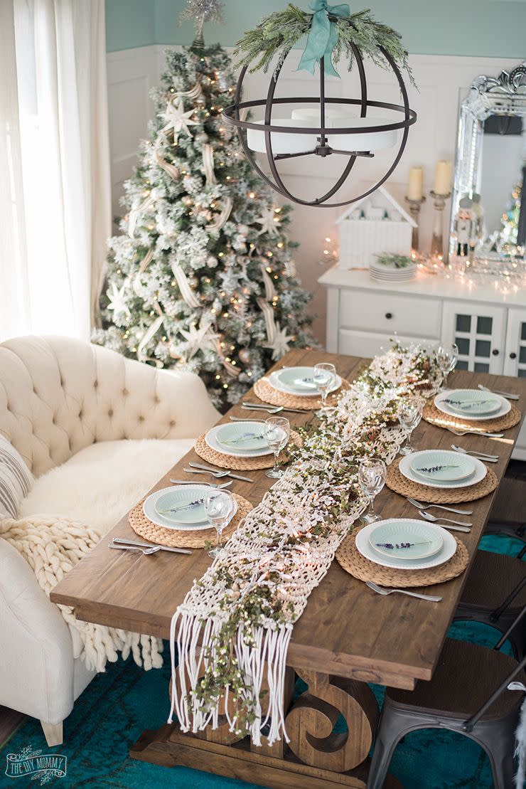 <p>There's nothing more romantic than a little mistletoe and a string of sparkling lights around the holiday season—and both can be found in this pretty centerpiece.</p><p><strong>Get the tutorial at <a href="http://thediymommy.com/french-country-farmhouse-christmas-dining-room-table-setting/" rel="nofollow noopener" target="_blank" data-ylk="slk:The DIY Mommy;elm:context_link;itc:0;sec:content-canvas" class="link ">The DIY Mommy</a>.</strong> </p><p><strong><a class="link " href="https://www.amazon.com/Mistletoe-Garland-Factory-Direct-Craft/dp/B0BGM74GC6/ref=sr_1_3?tag=syn-yahoo-20&ascsubtag=%5Bartid%7C10050.g.644%5Bsrc%7Cyahoo-us" rel="nofollow noopener" target="_blank" data-ylk="slk:Shop Now;elm:context_link;itc:0;sec:content-canvas">Shop Now</a><br></strong></p>