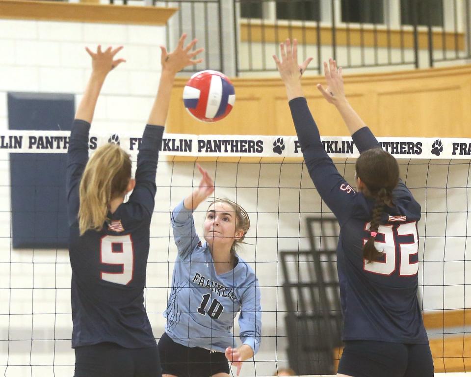 Franklin's Taylor Lacerda goes up for a spike in the third set of their match at Franklin High School on Tuesday, Sept. 26, 2023. Franklin would go on to win 3-0.