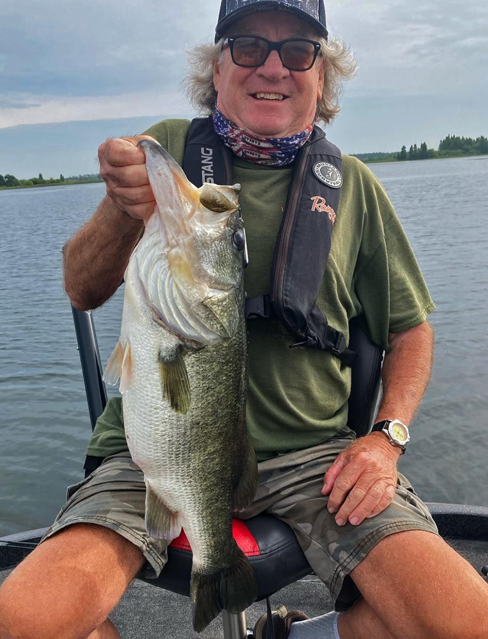 Bob Clark, of Lakeland, caught this 8.2-pound largemouth bass on a black and blue Senko, rigged on a 1/8 oz. weight, while fishing a Bartow area phosphate pit this week.