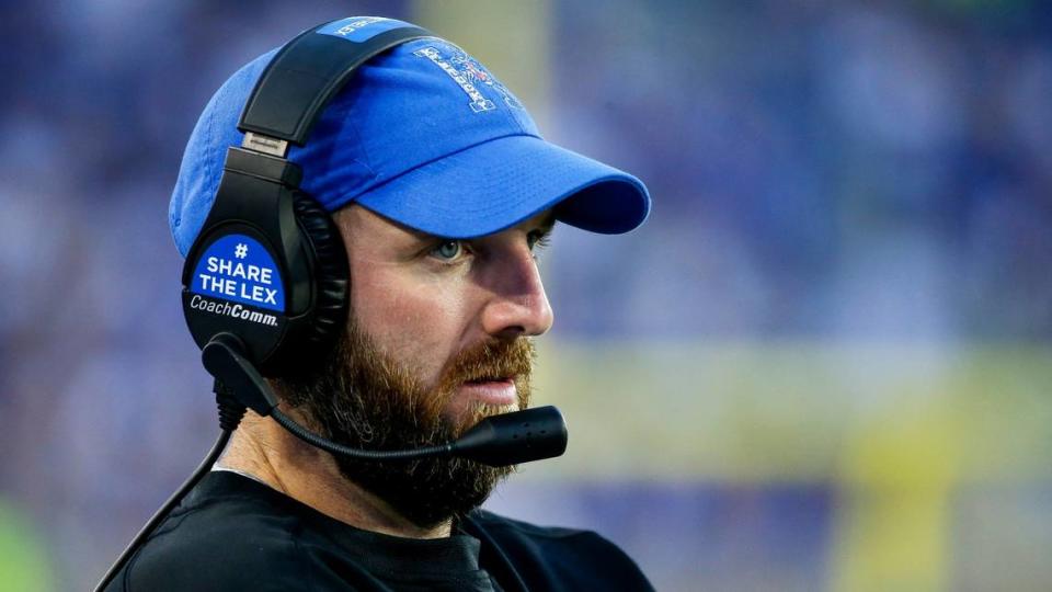 Wide receivers coach Scott Woodward spent three seasons at Kentucky, including two working with close friend Liam Coen.