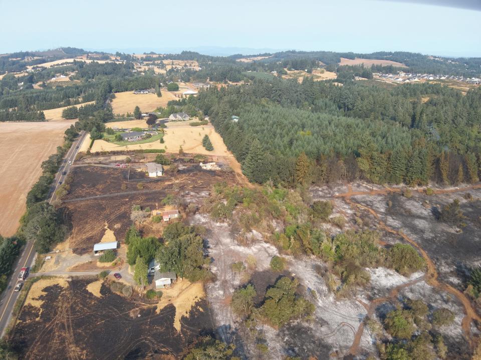 In the distance of this aerial image captured by a Salem Police Department drone pilot are two properties on Jory Hill Road S most impacted by the Liberty Fire. Both homes were saved thanks to the work of more than 100 personnel and 30 apparatus dispatched to fight the fire.