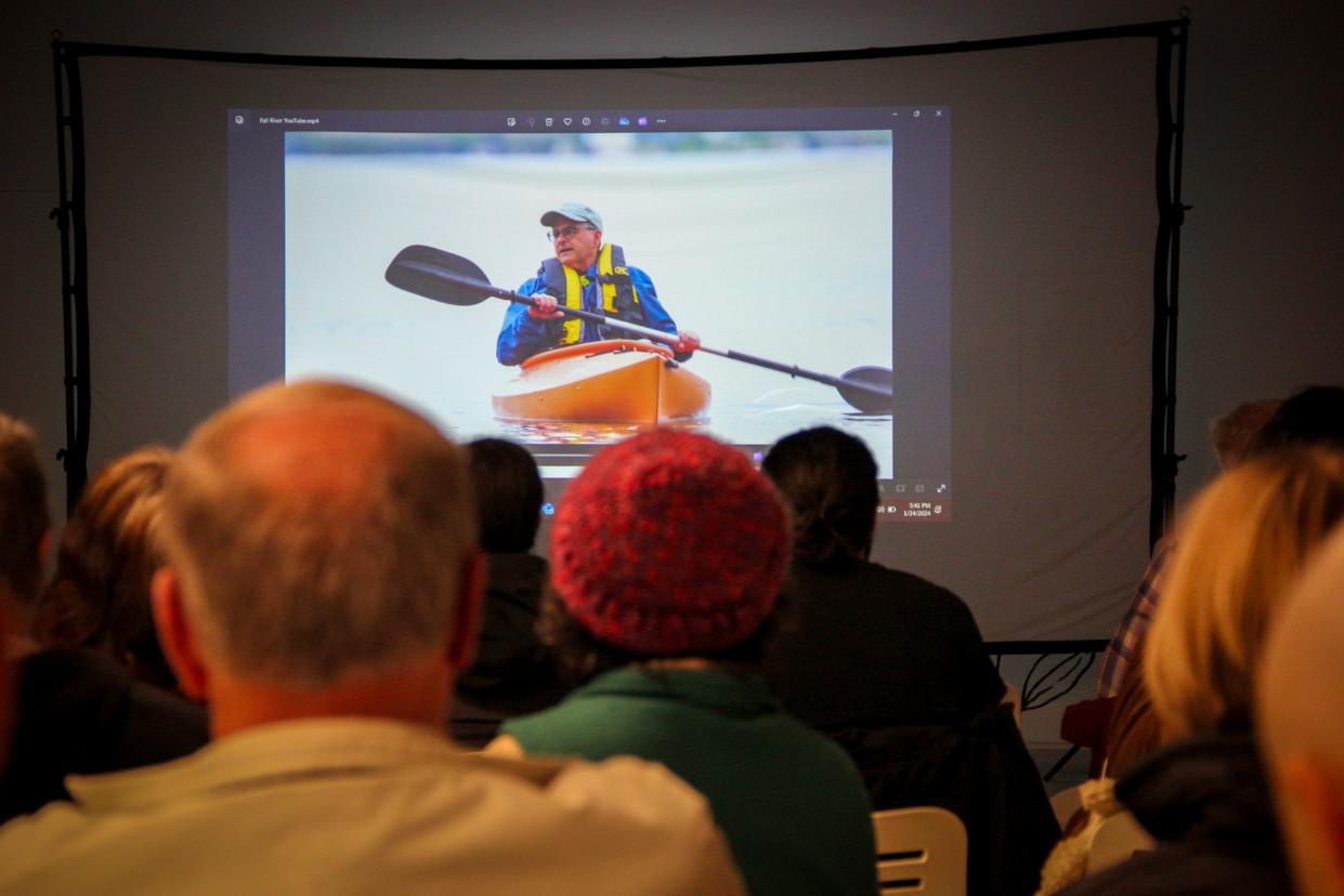 A crowd at the Fall River Arts and Culture Coalition Ignition Space, 44 Troy St., watches an episode of Explore New England focused on Fall River tourism, on Wednesday, Jan. 24.