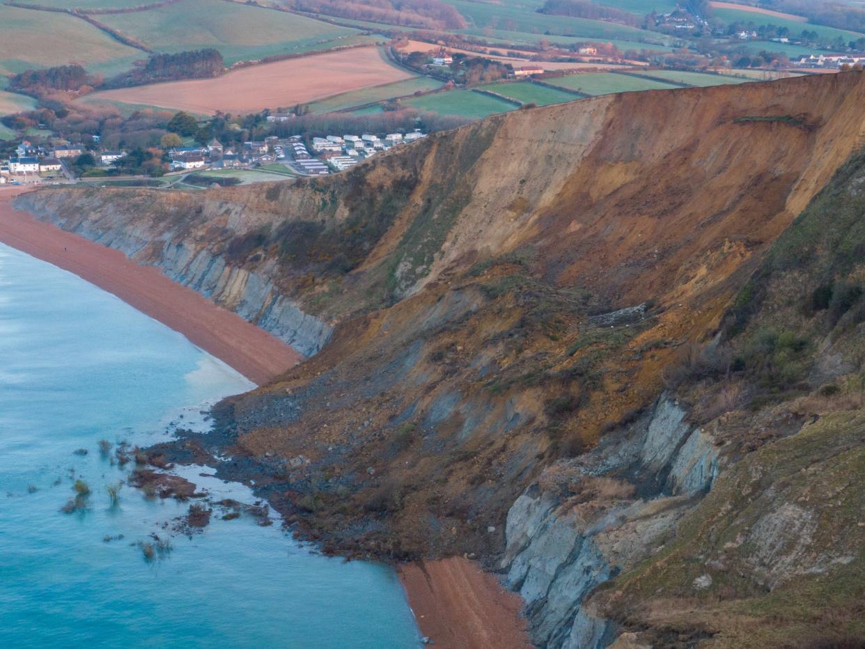 An aerial view of a cliff fall on 14 April in Seatown. The 4,000-ton rockfall blocked off the beach (Getty Images)