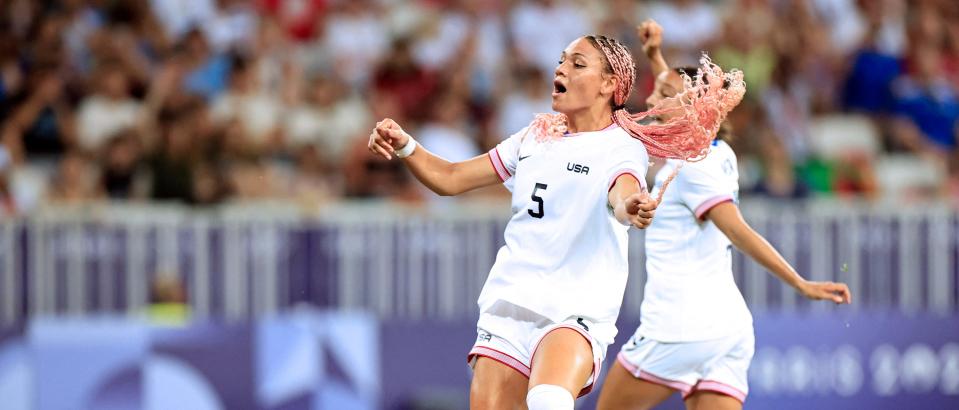 US' forward #05 Trinity Rodman celebrates scoring the opening goal in the women's group A football match between the USA and Zambia during the Paris 2024 Olympic Games at the Nice Stadium in Nice, on July 25, 2024. (Photo by Valery HACHE / AFP)