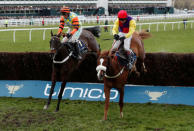 Horse Racing - Cheltenham Festival - Cheltenham Racecourse, Cheltenham, Britain - March 16, 2018 Native River ridden by Richard Johnson in action before winning the 15.30 Timico Cheltenham Gold Cup Chase Action Images via Reuters/Andrew Boyers