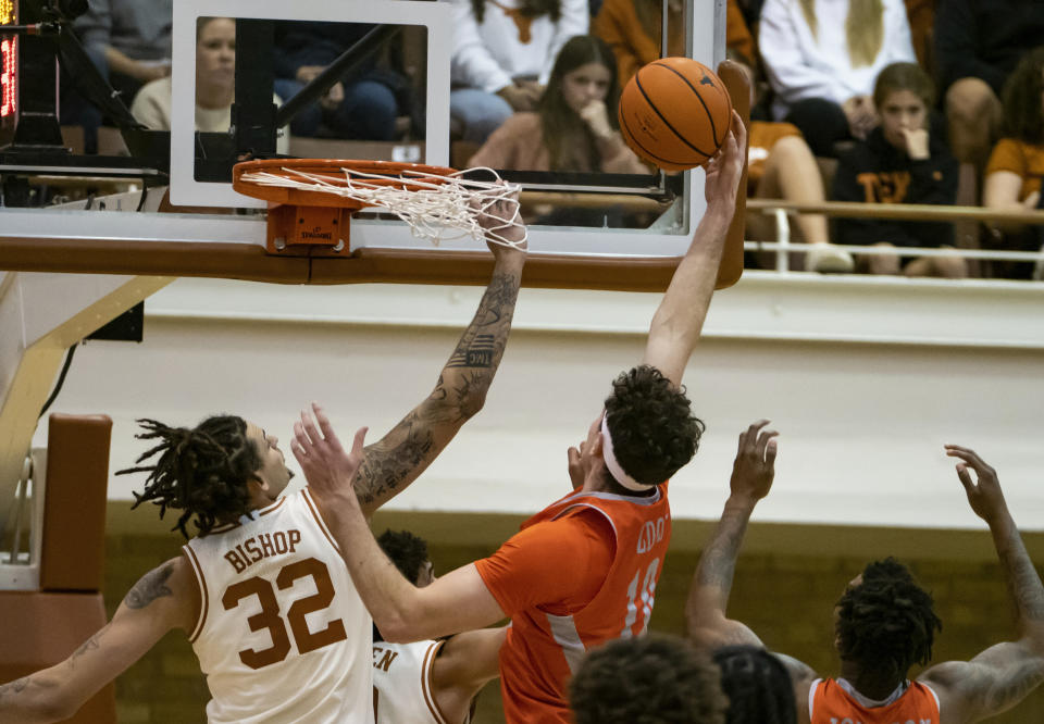 Texas Rio Grande Valley forward Dima Zdor (10) goes up to shoot against Texas forward Christian Bishop (32) during the first half of an NCAA college basketball game, Saturday, Nov. 26, 2022, in Austin, Texas. (AP Photo/Michael Thomas)