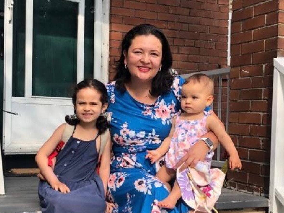 Bibian Aguirre says it would be devastating to say goodbye to her daughter's daycare if it doesn't opt-in to the government's $10-a-day childcare program. (Submitted by Bibian Aguirre - image credit)