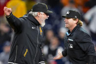 Pittsburgh Pirates manager Derek Shelton, left, argues with home plate umpire Mike Muchlinski after being ejected during the seventh inning of the team's baseball game against the Washington Nationals at Nationals Park, Wednesday, April 3, 2024, in Washington. The Nationals won 5-3. (AP Photo/Alex Brandon)