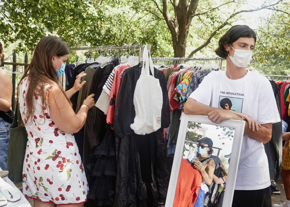 Brooklyn, NY - August 9, 2020Attendees browse the goods for sale at the "Black Lives Matter Sidewalk Sale", a fundraising event that has taken place at on Sundays at McGolrick Park since early June.