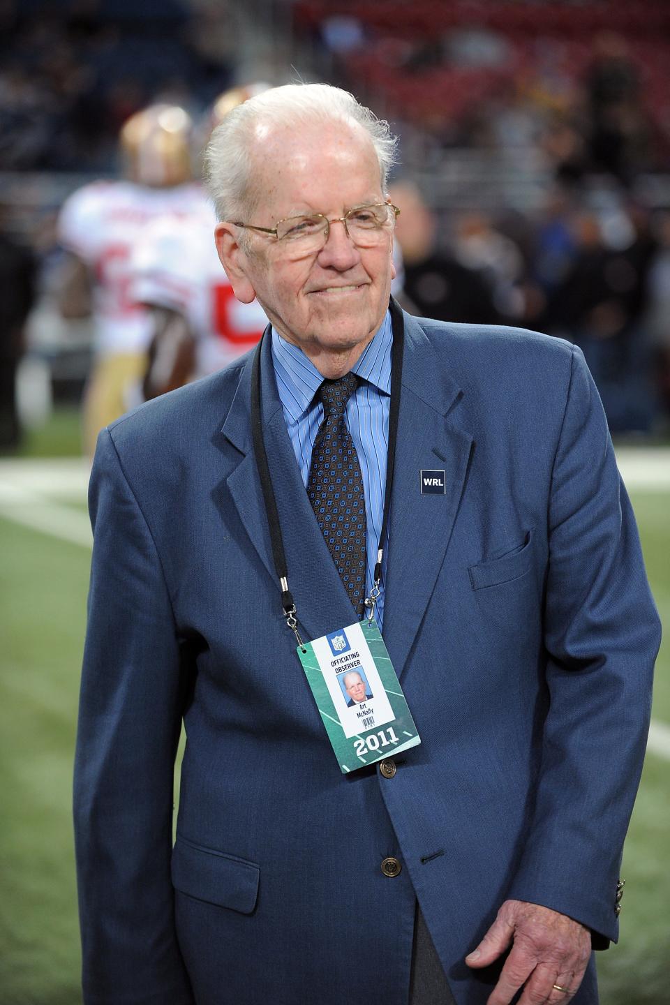 Former Director of Officiating for the National Football League Art McNally is seen prior to a game between the San Francisco 49ers and St. Louis Rams on Sunday, January 1, 2012 in St. Louis. (AP Photo/G. Newman Lowrance)